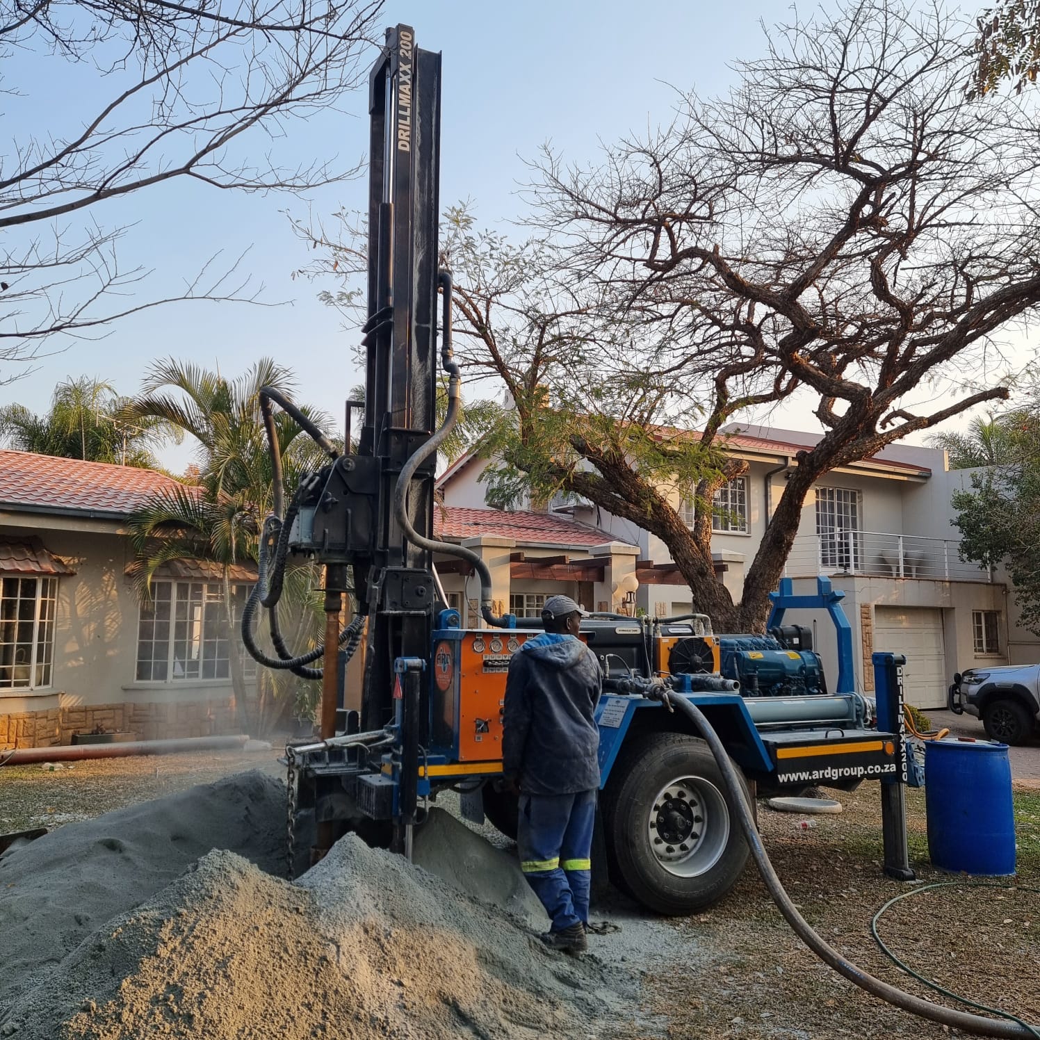 Borehole drilling rig on site